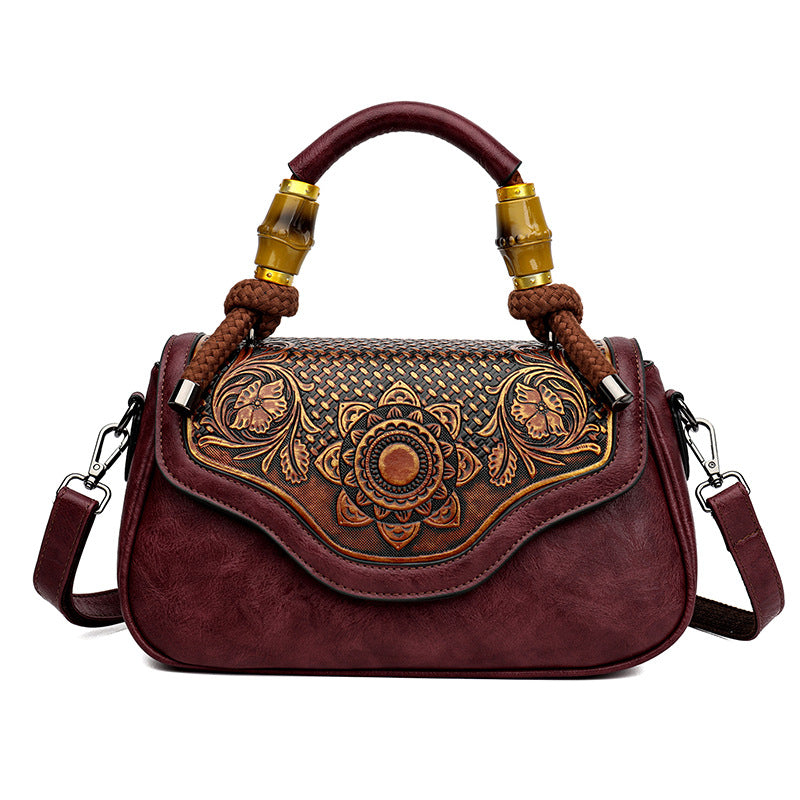 Bolso bandolera retro de cuero repujado artesanal
