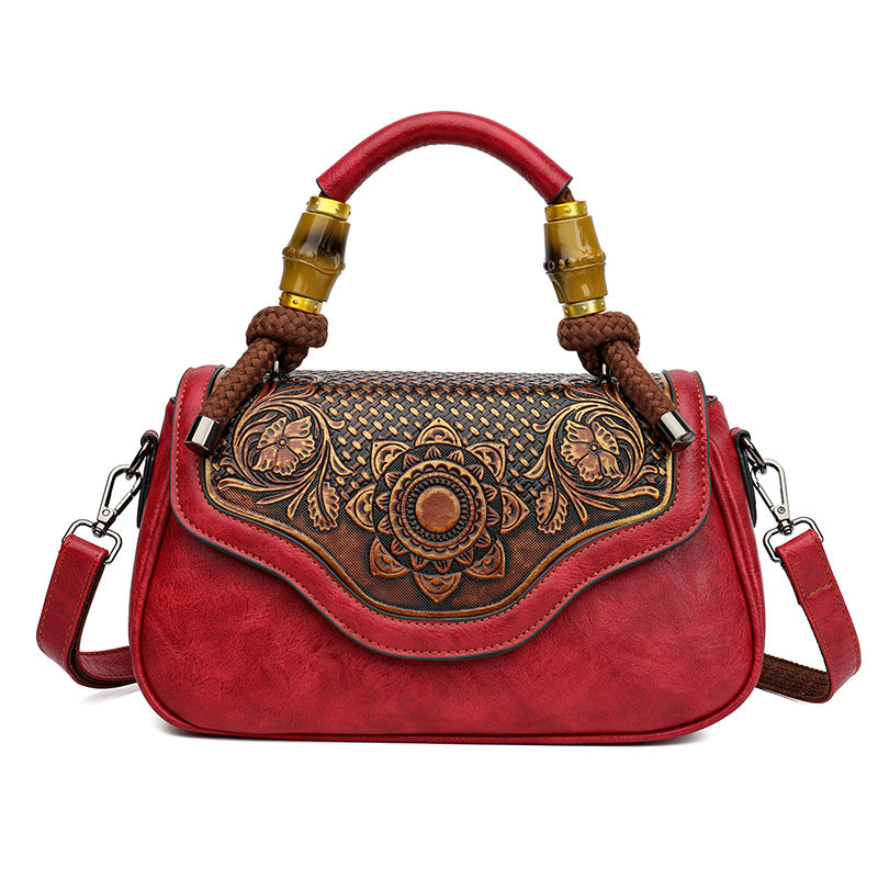 Bolso bandolera retro de cuero repujado artesanal