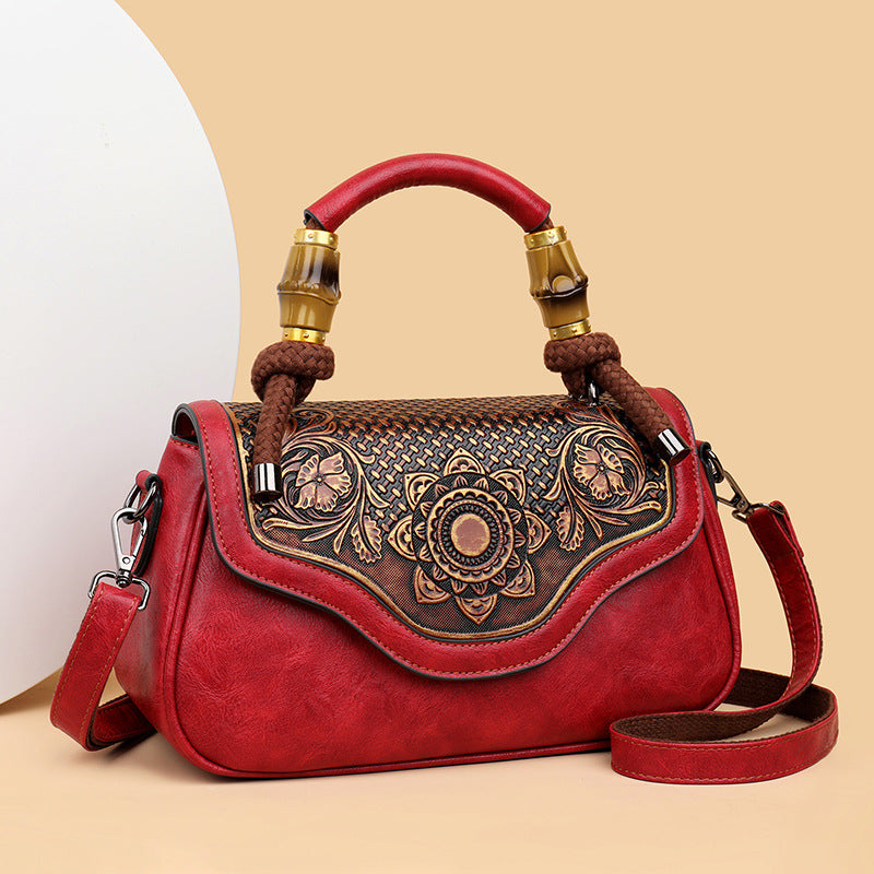 Bolso bandolera retro de cuero repujado artesanal