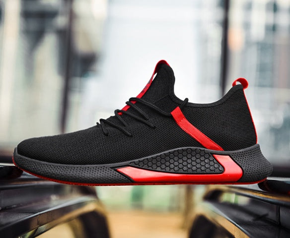 Zapatillas de running bajas transpirables de tejido elástico