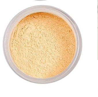 Polvo facial suelto translúcido para fijar el maquillaje y la base.