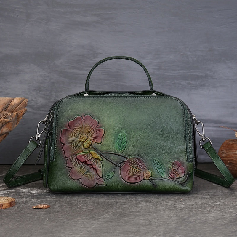 Vintage Cowhide Pillow Bag With Embossed Detailing And A Handheld Design