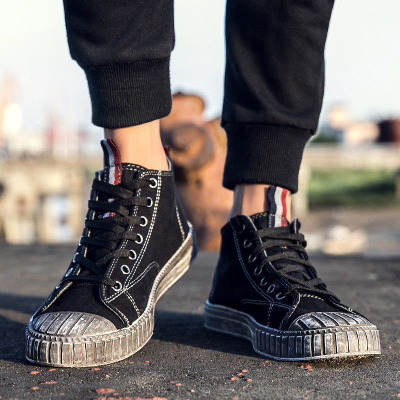 Black distressed casual shoes