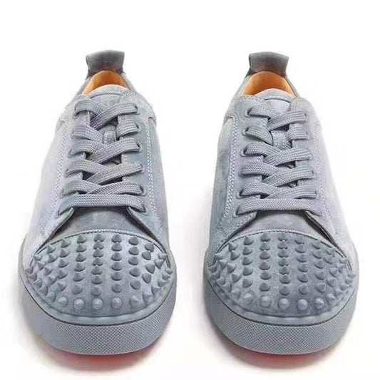 Zapatillas de caña baja con puntera esmerilada y pinchos