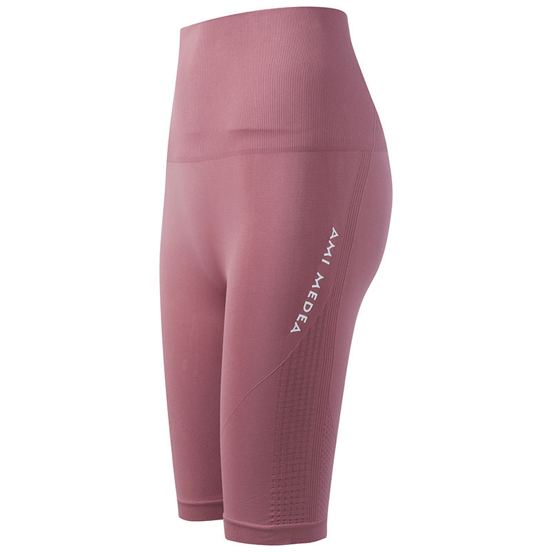 Pantalones de yoga de cintura alta durazno de cinco puntos