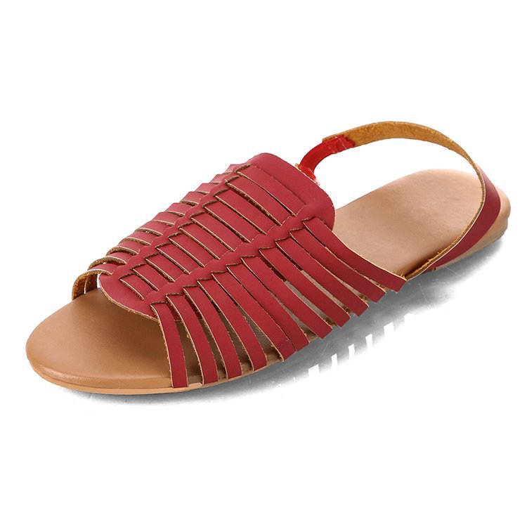 Sandalias planas caladas de espiga