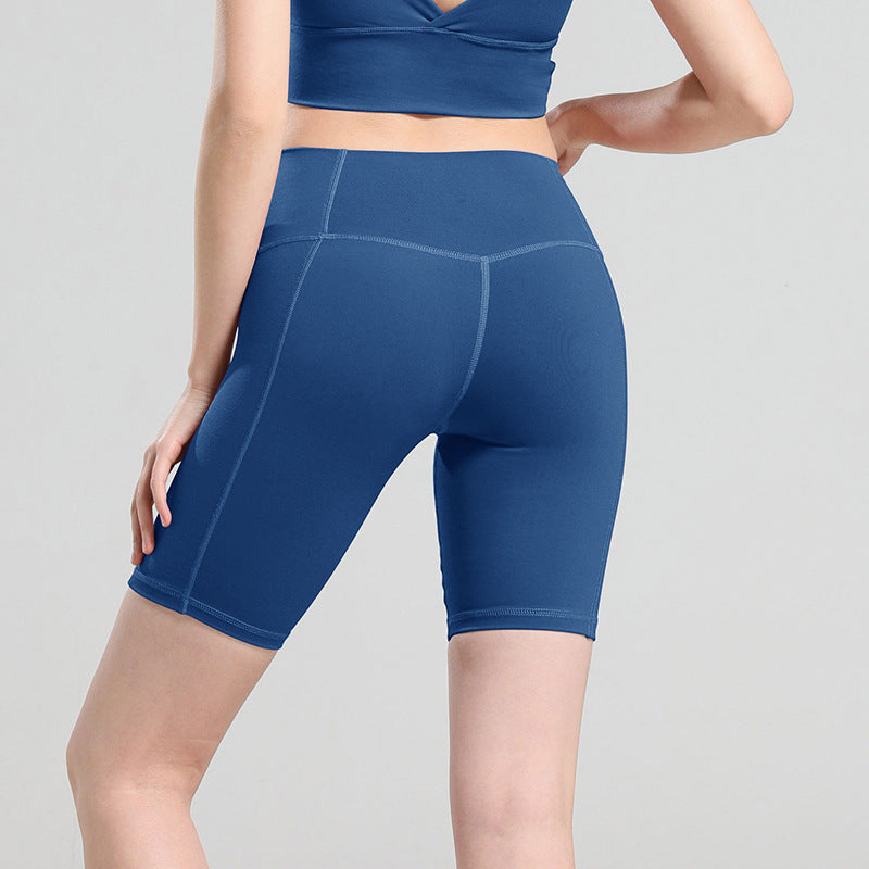 Pantalones cortos de yoga de cintura alta que moldean la cadera