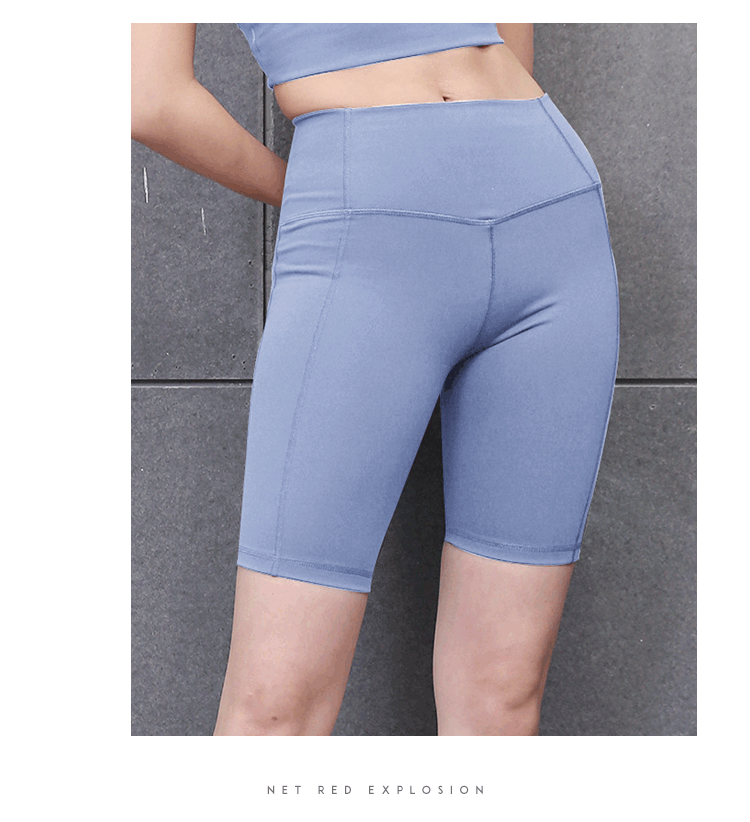 Pantalones cortos de yoga de cintura alta que moldean la cadera