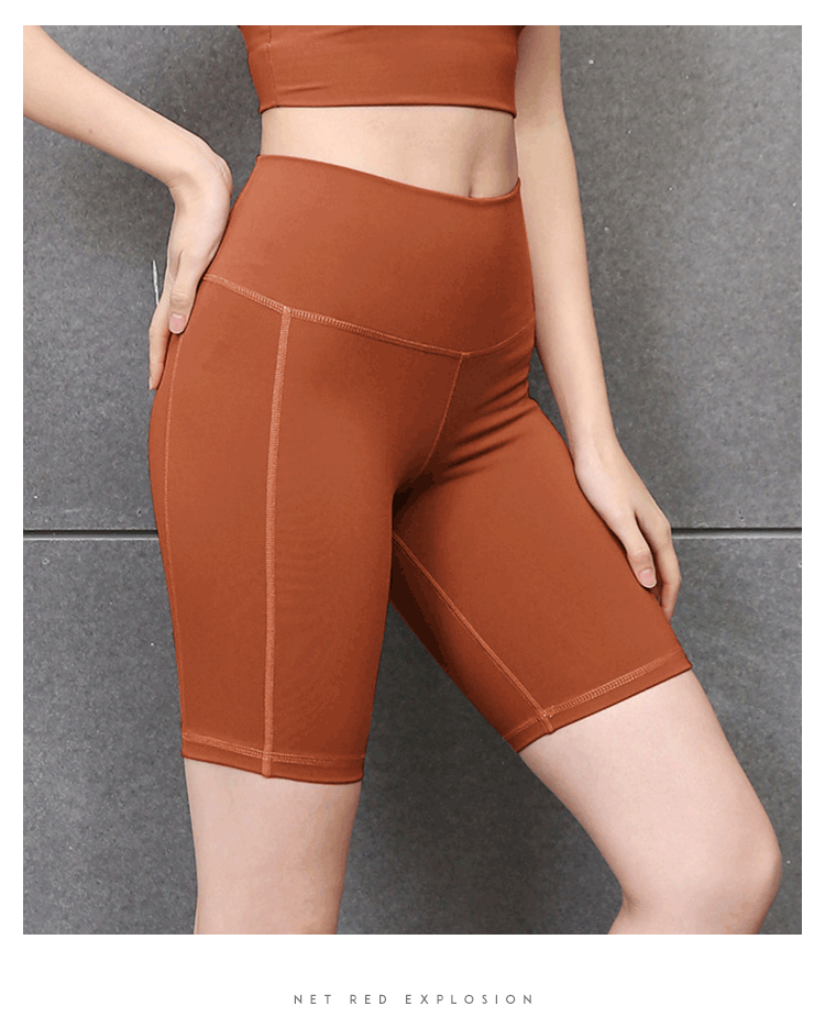 Pantalones cortos de yoga de cintura alta que moldean la cadera