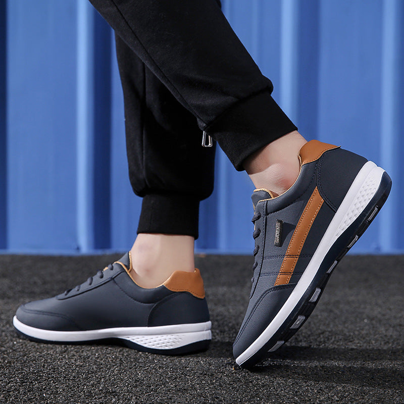 Zapatos deportivos casuales de cuero versátiles e impermeables