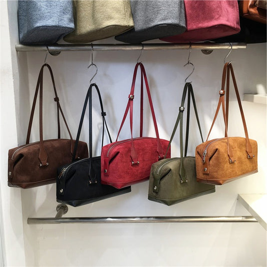 Bolso Boston de mano de ante retro para bolos
