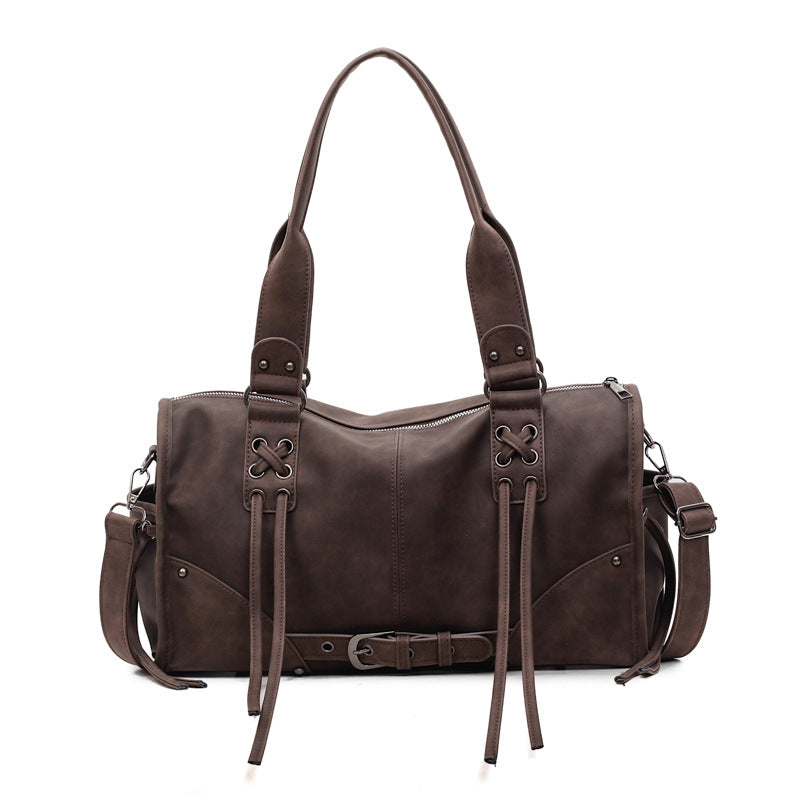 Bolso retro de mujer de mano y un solo hombro