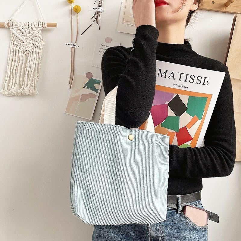 Bolso tote de estilo minimalista con hilo rugoso y estampados a doble cara, un bolso de lona versátil de gran capacidad para mujer