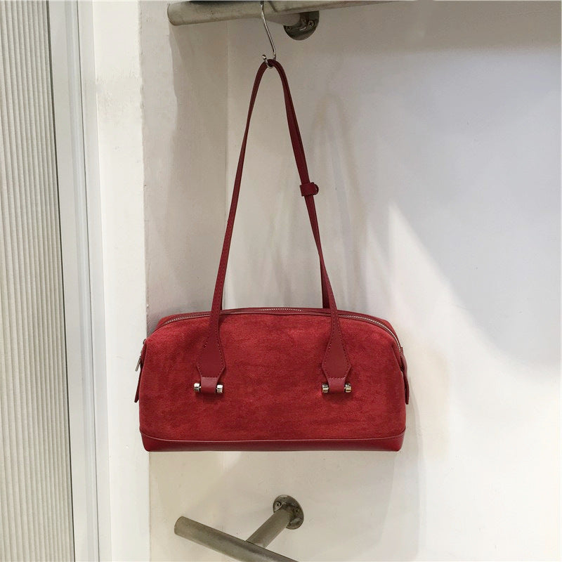 Bolso Boston de mano de ante retro para bolos