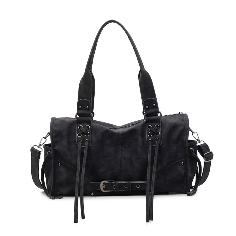 Bolso retro de mujer de mano y un solo hombro