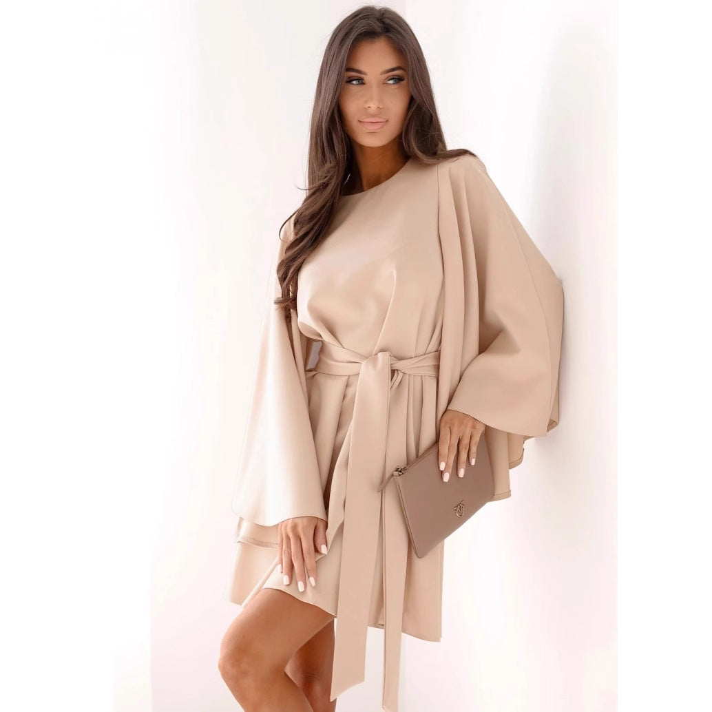 Vestido de otoño de color liso con cuello redondo, mangas acampanadas y cordones en la cintura