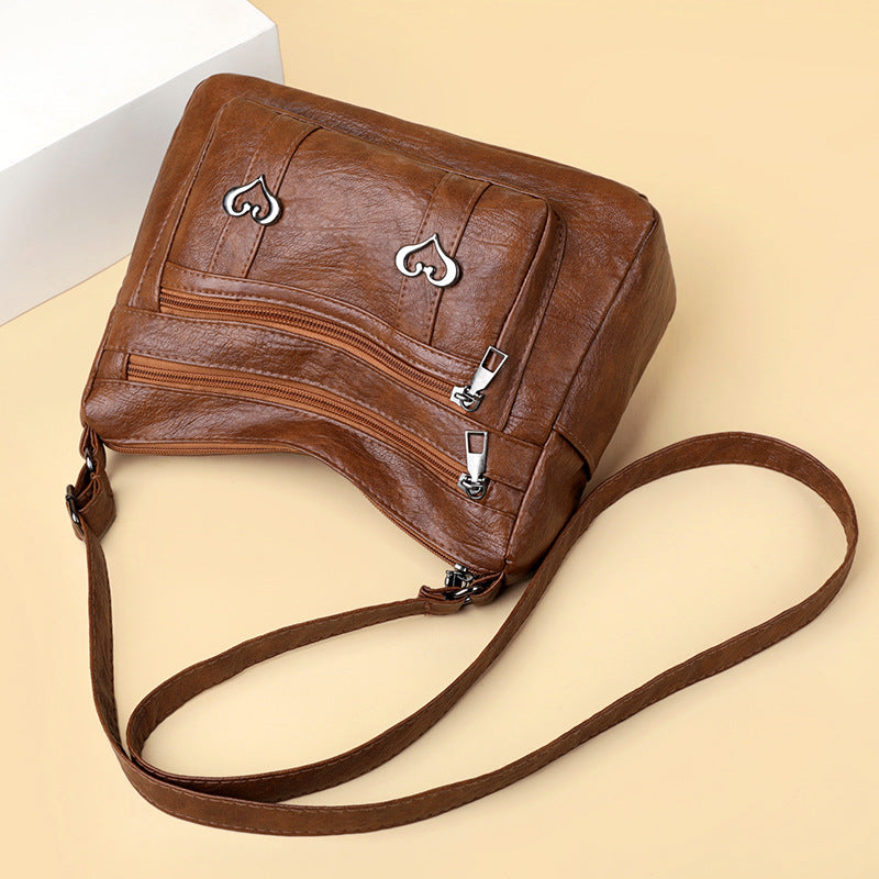 Bolso cruzado retro, moderno y versátil