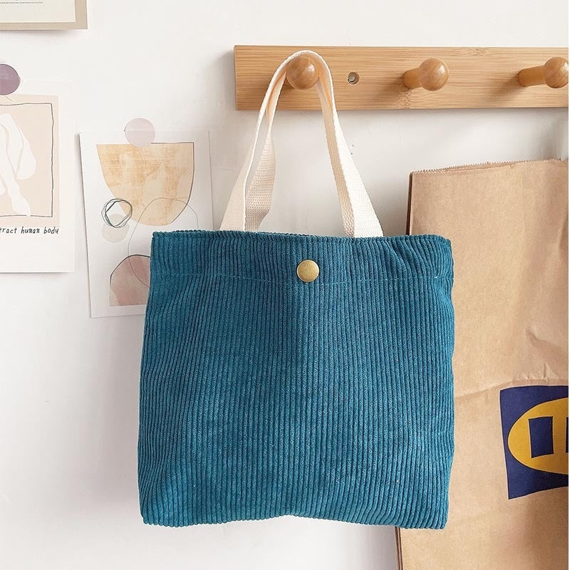 Bolso tote de estilo minimalista con hilo rugoso y estampados a doble cara, un bolso de lona versátil de gran capacidad para mujer