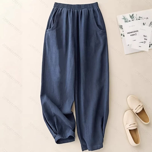 Pantalones bombachos de algodón y lino azul marino con ajuste en los tobillos para mujer