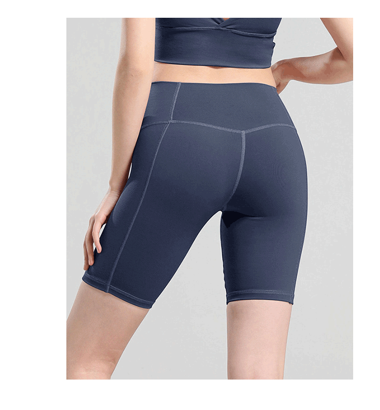 Pantalones cortos de yoga de cintura alta que moldean la cadera