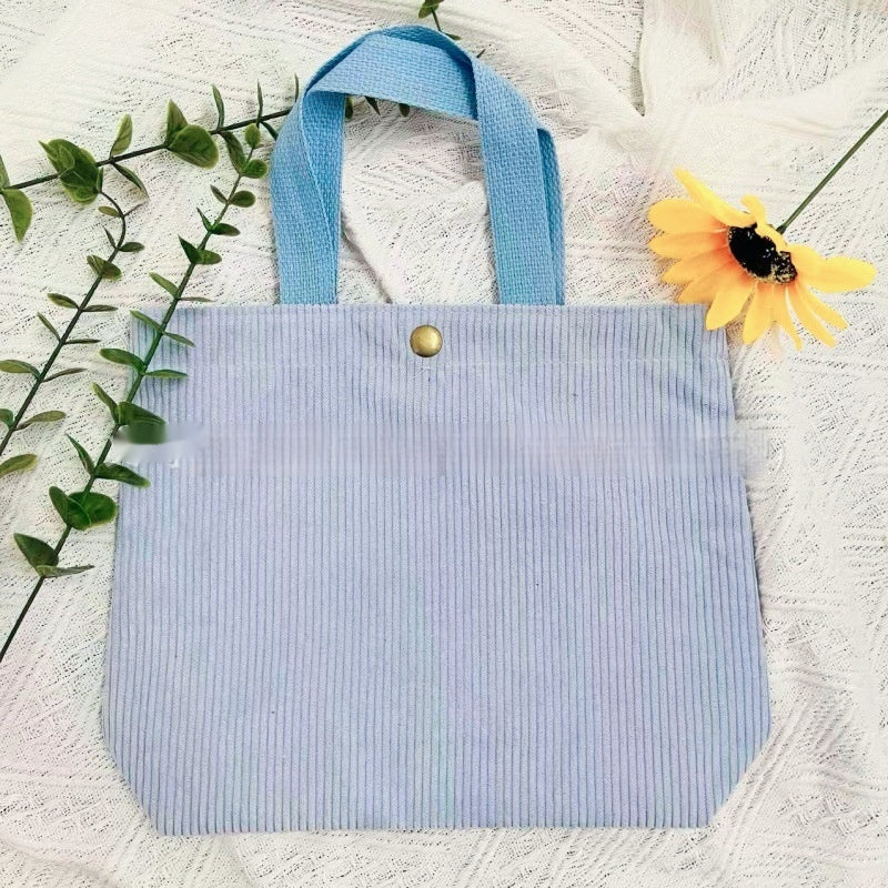 Bolso tote de estilo minimalista con hilo rugoso y estampados a doble cara, un bolso de lona versátil de gran capacidad para mujer