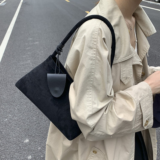 Bolso bandolera moderno que combina con todo