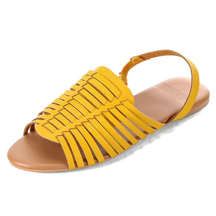 Sandalias planas caladas de espiga