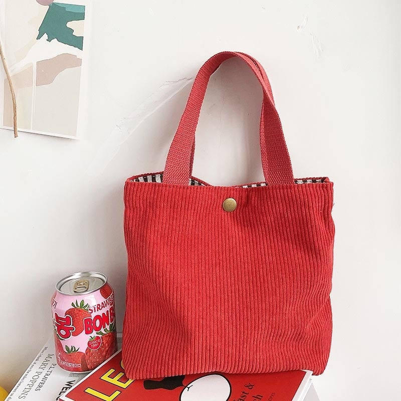 Bolso tote de estilo minimalista con hilo rugoso y estampados a doble cara, un bolso de lona versátil de gran capacidad para mujer
