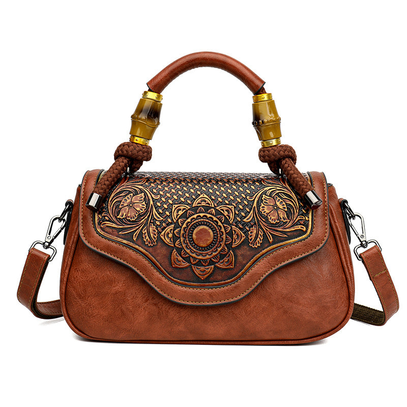 Bolso bandolera retro de cuero repujado artesanal