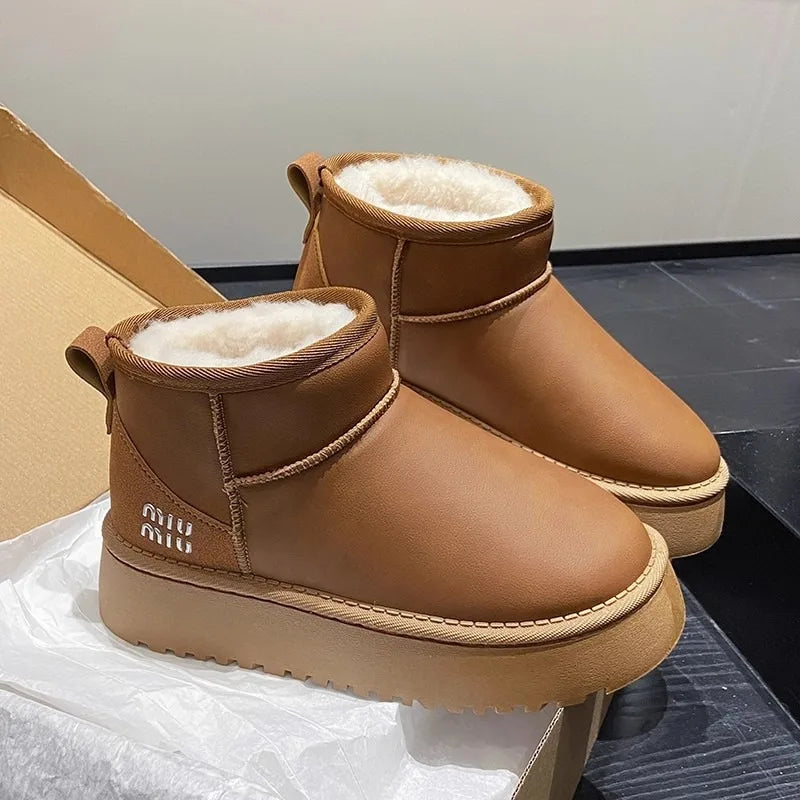 Sponge cake thick soled snow boots for women, 2025 new winter waterproof short tube height increasing warm bread shoes