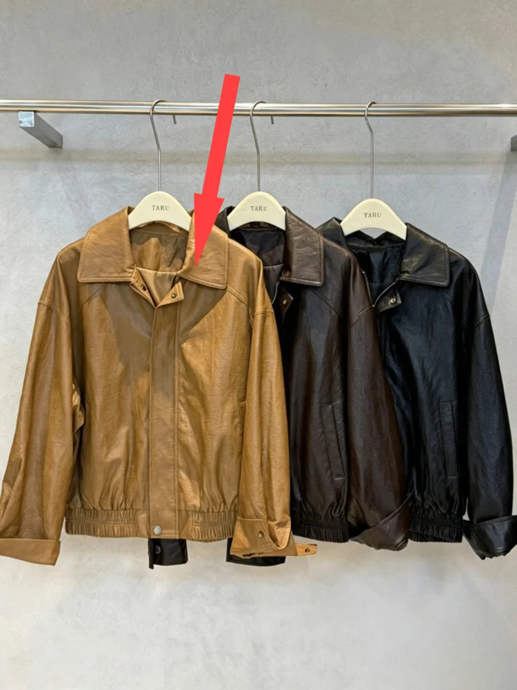 TOKO 2026 New Women Lapel Faux Leather Bomber Jacket Elastic Hem Zip Button Loose Long Sleeve Side Pocket Outerwear Coat