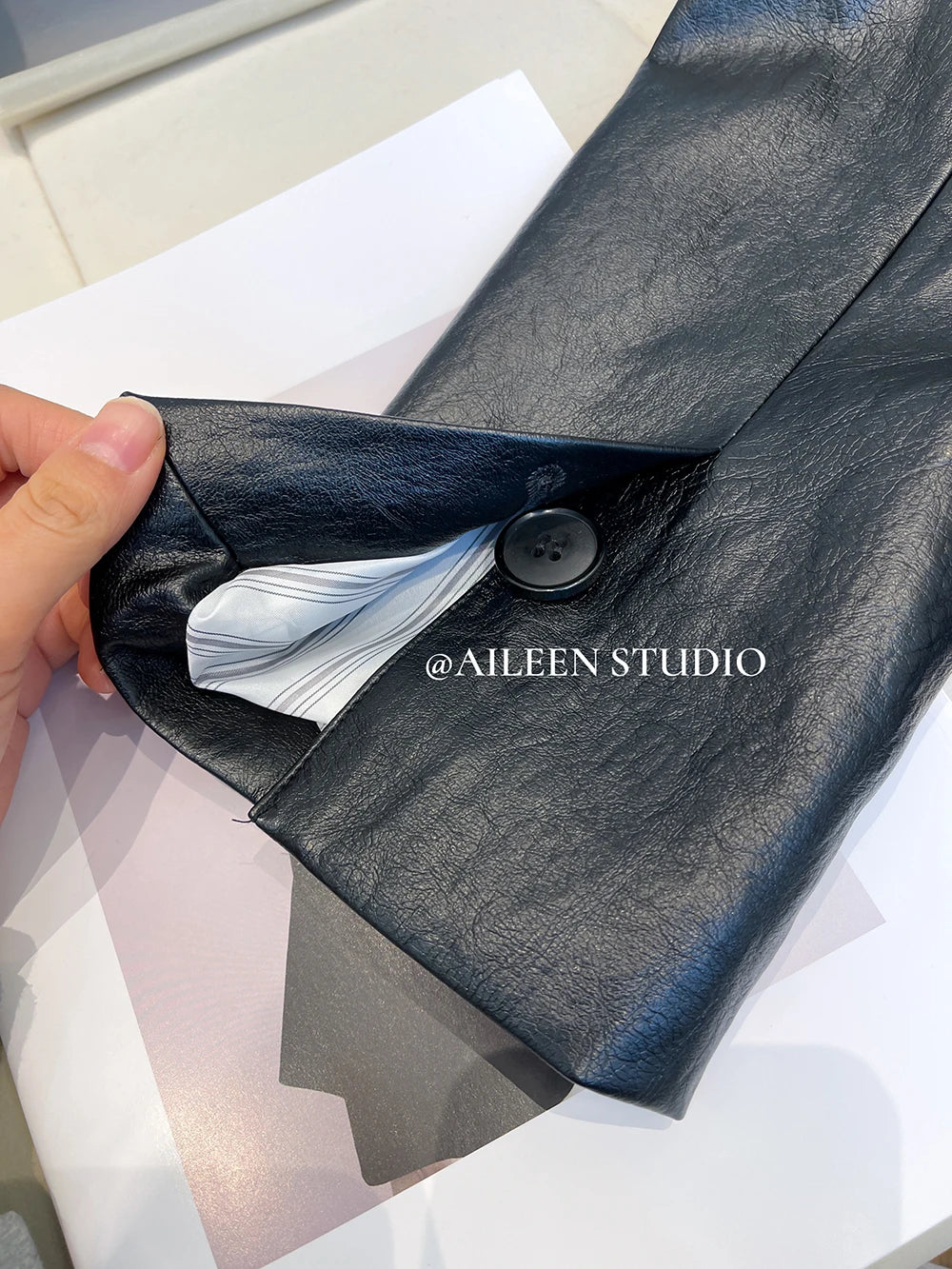 Black Leather Jacket Women's Autumn 2026 New Korean Loose High-End Feeling Personality Suiting PU Material Top Trendy