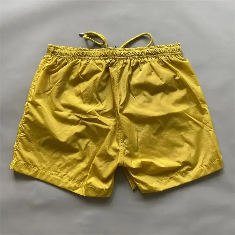 Top quality luxury knee-length  summer youth leisure sports nylon shorts loose men's beach 5-point pants