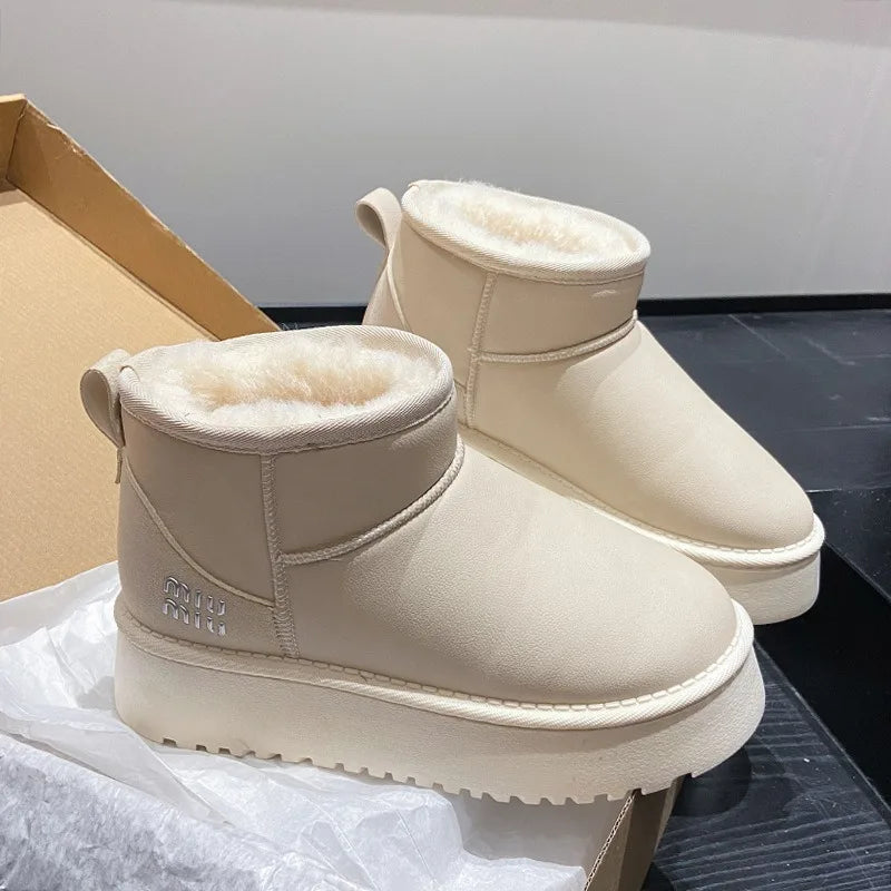 Sponge cake thick soled snow boots for women, 2025 new winter waterproof short tube height increasing warm bread shoes