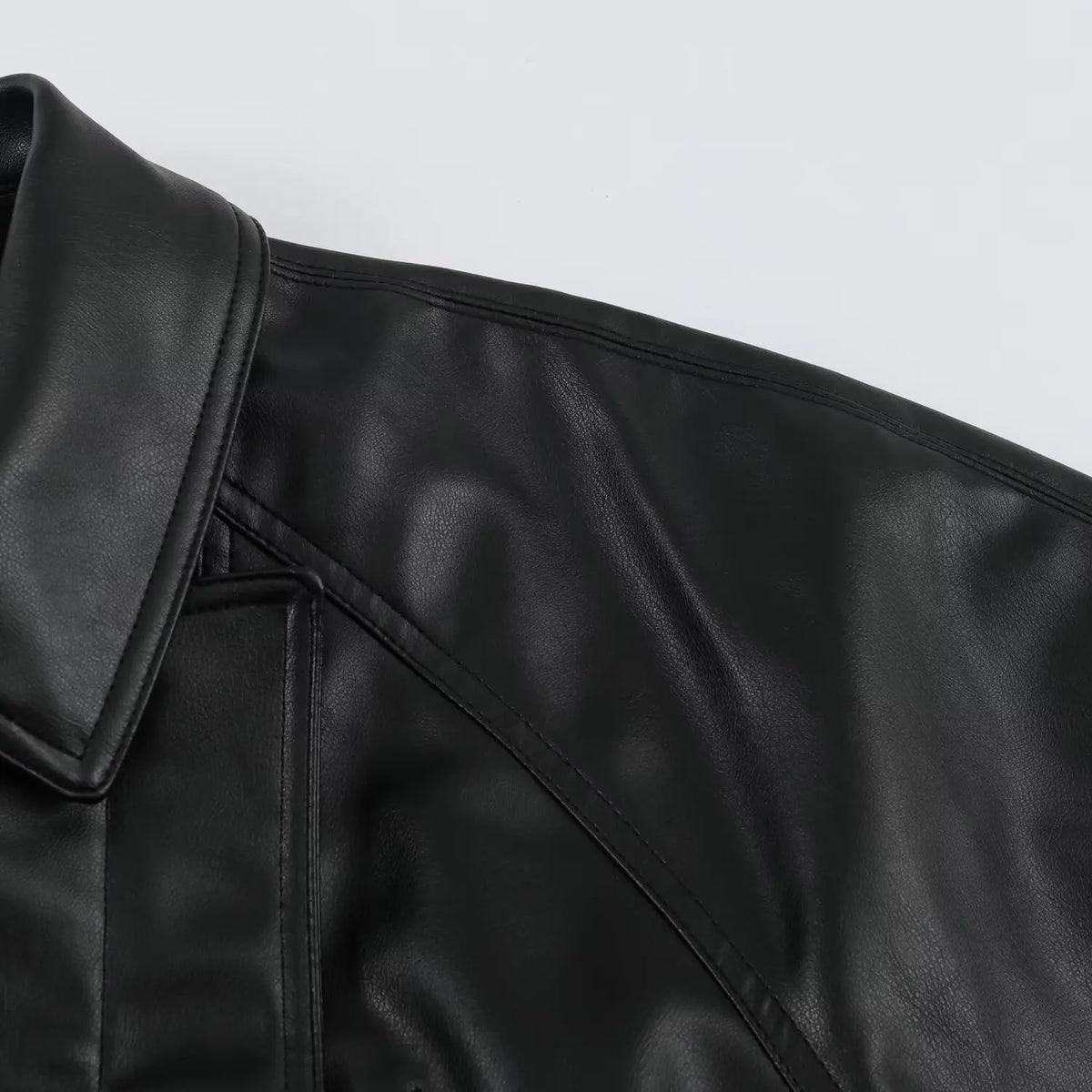 Women's PU Leather Jacket 2026 Retro Black Lapel Asymmetrical Zipper Belted Waist Zipper Pockets Cropped Biker Coat