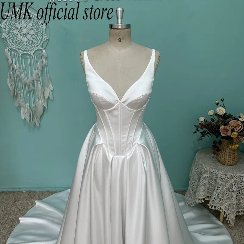 UMK Luxury Satin A Line Wedding Dress Sexy V Neck Sleeveless Spaghetti Straps Modern Bridal Dresses customized