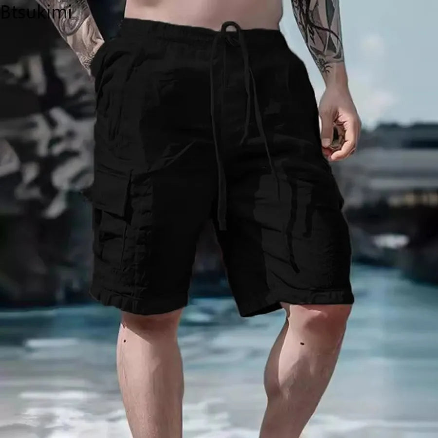 2026 Men's Summer Fashion Loose White Cargo Shorts Handsome Streetwear Beachwear Solid Color With Pockets Shorts Workout Pants