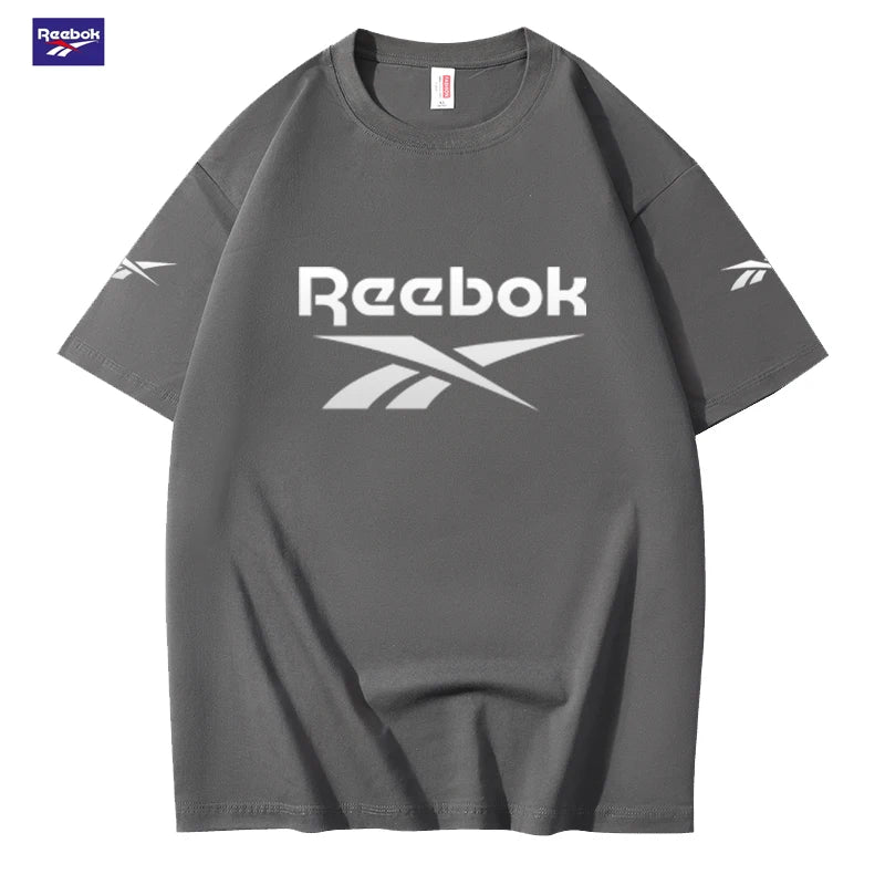 Reebok Summer New Color-Block Short Sleeve - Suitable for Men and Women. Loose and Comfortable. Fashionable Street Style.