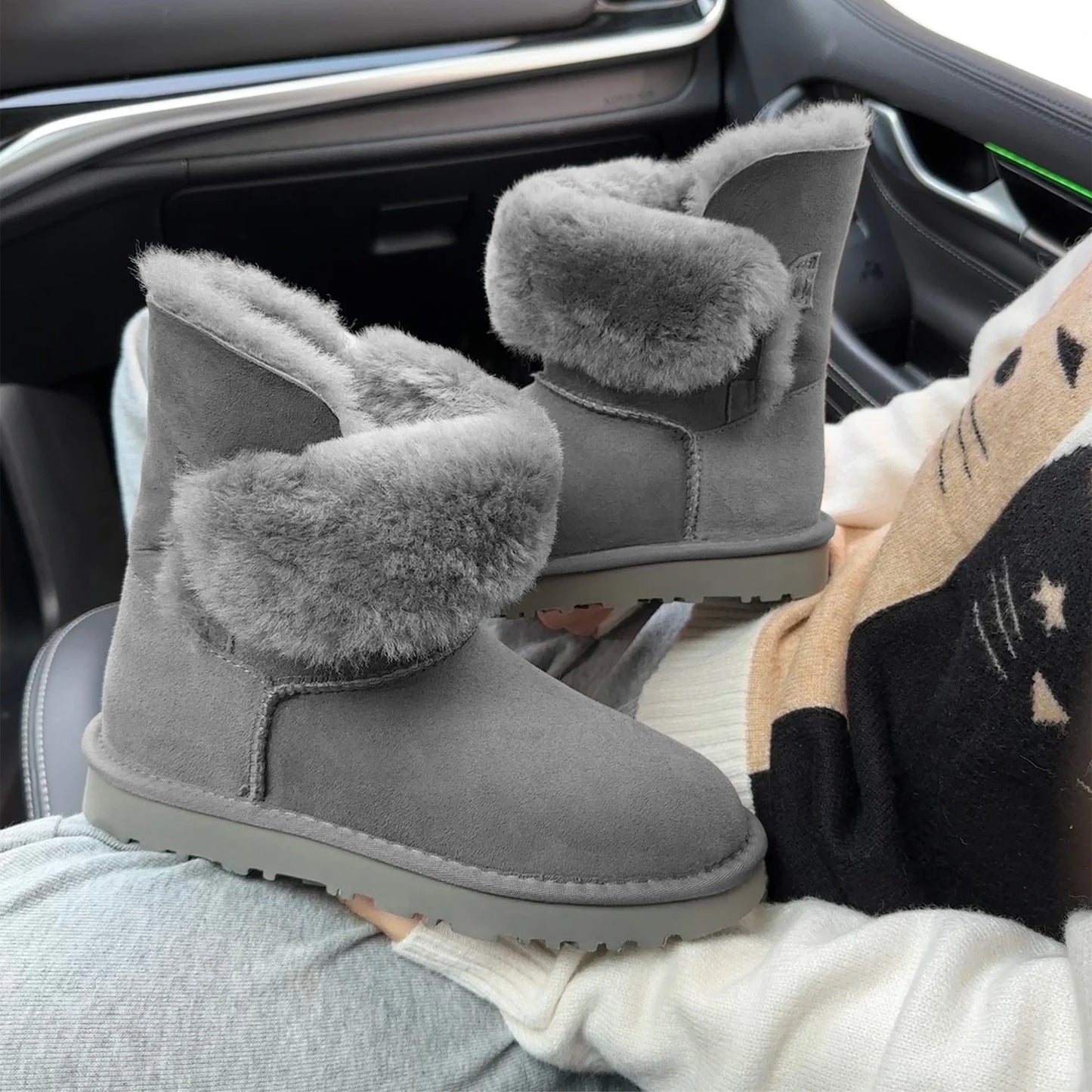 A Pair of Pure Sheepskin and Wool Winter Snow Boots for Women, Warm and Comfortable. Simple and Fashionable Women's Shoes