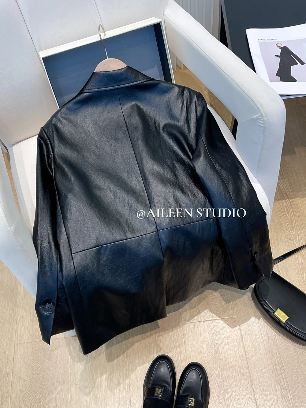 Black Leather Jacket Women's Autumn 2026 New Korean Loose High-End Feeling Personality Suiting PU Material Top Trendy