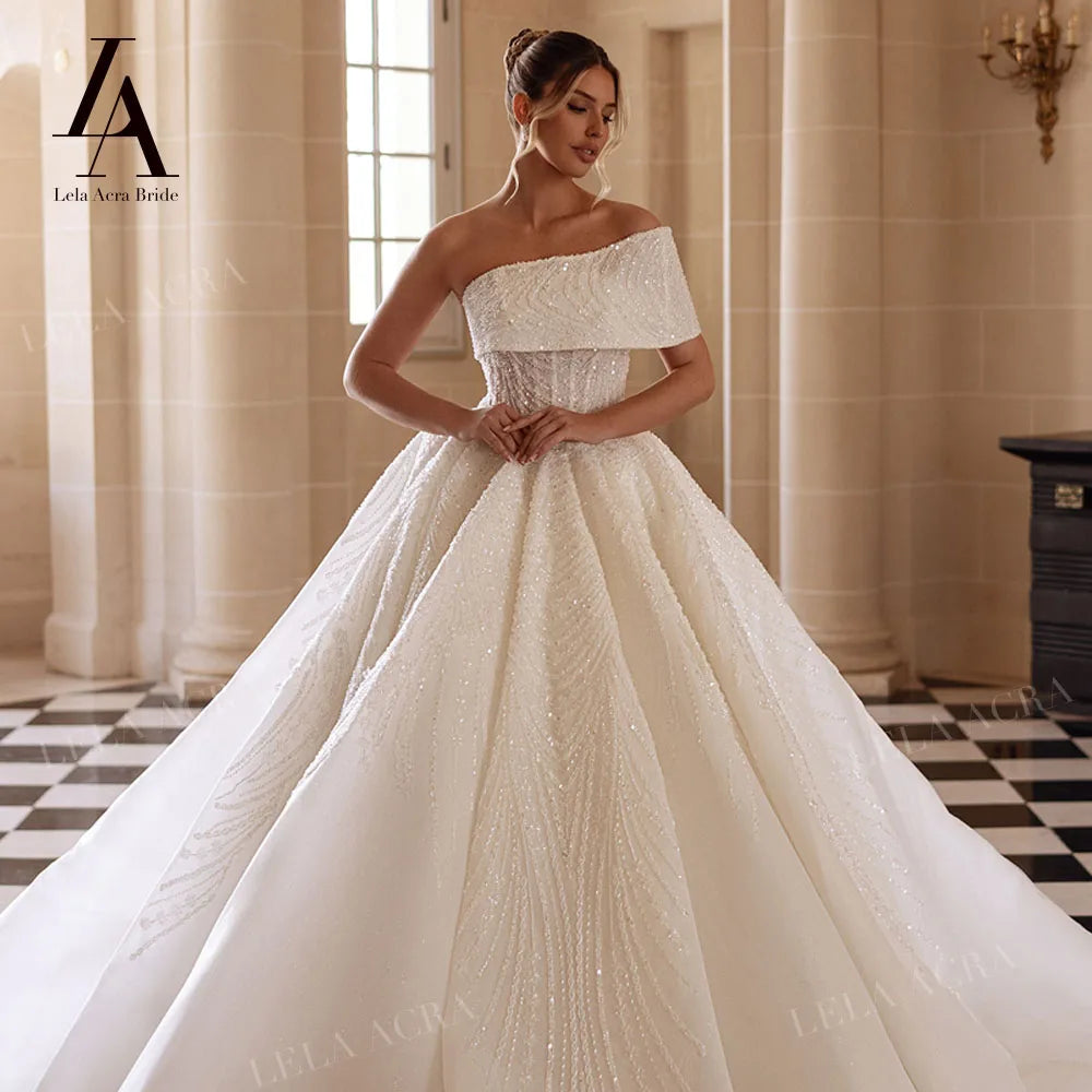 LelaAcra Luxury A-Line Wedding Dress 2026 Off the Shoulder Beading Princess Bride Gown SM244 Customized Party Vestido De Noiva