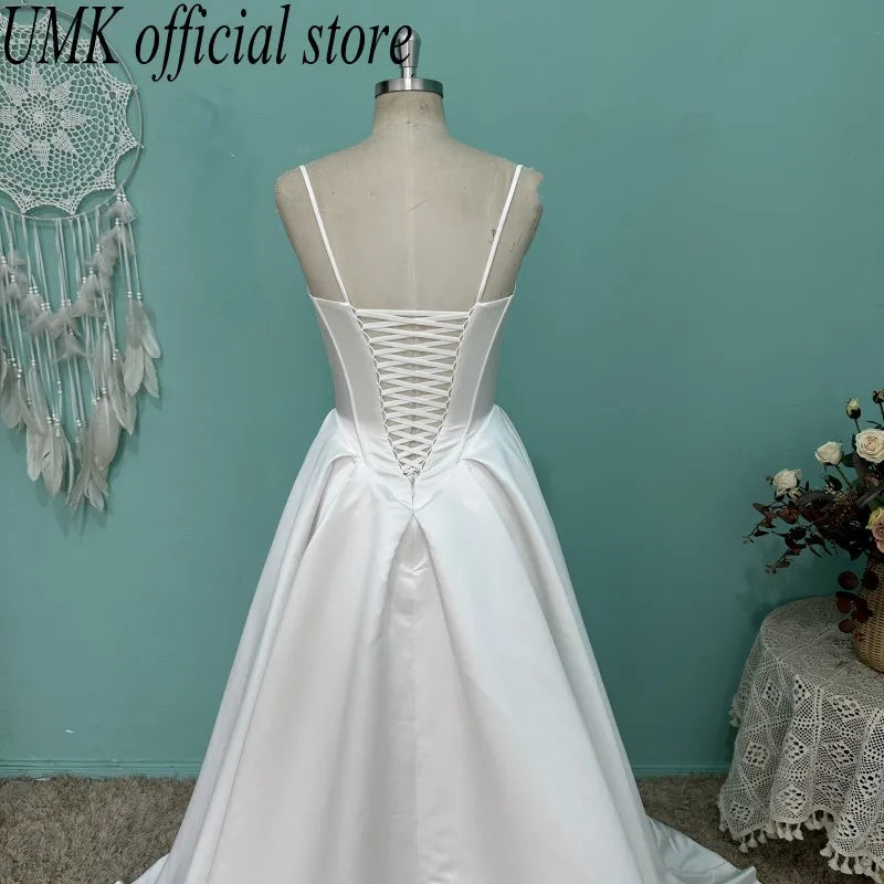 UMK Luxury Satin A Line Wedding Dress Sexy V Neck Sleeveless Spaghetti Straps Modern Bridal Dresses customized