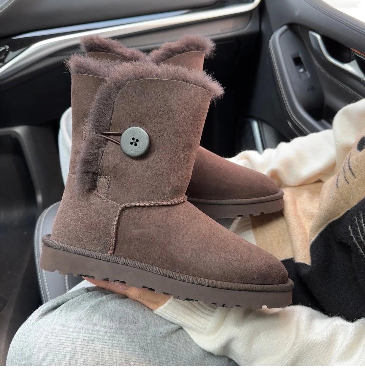 A Pair of Pure Sheepskin and Wool Winter Snow Boots for Women, Warm and Comfortable. Simple and Fashionable Women's Shoes