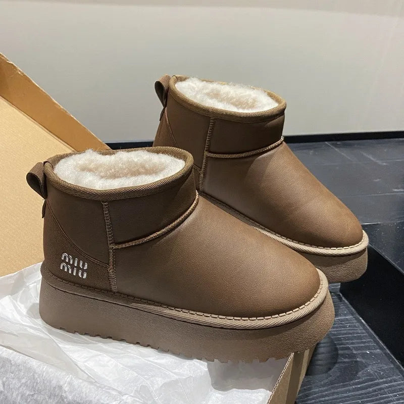 Sponge cake thick soled snow boots for women, 2025 new winter waterproof short tube height increasing warm bread shoes