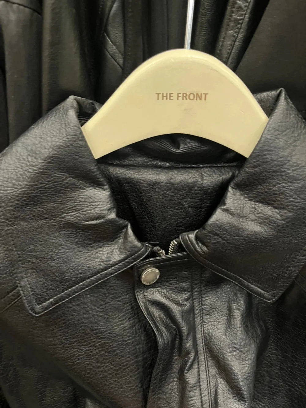 TOKO 2026 New Women Lapel Faux Leather Bomber Jacket Elastic Hem Zip Button Loose Long Sleeve Side Pocket Outerwear Coat
