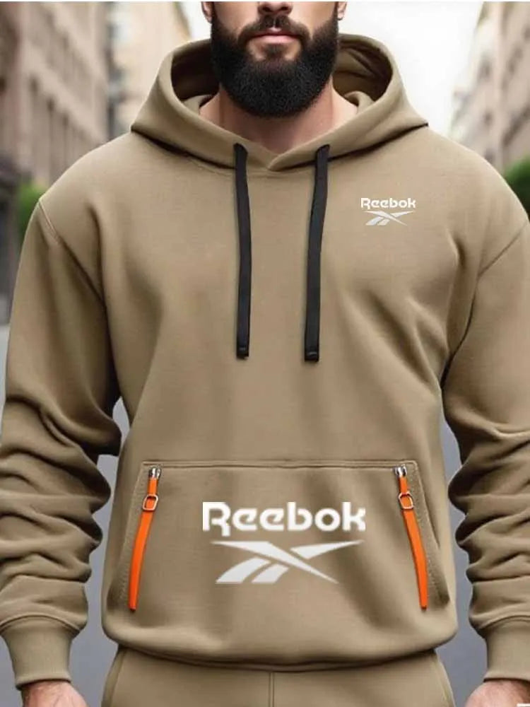 Reebok Men's Sports Sweatshirt, Loose and Casual, Pullover Hooded Shirt, Plain Color with Multiple Pockets Design, Simple and Li