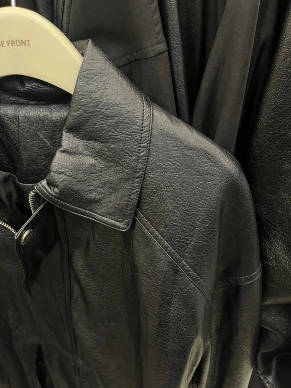TOKO 2026 New Women Lapel Faux Leather Bomber Jacket Elastic Hem Zip Button Loose Long Sleeve Side Pocket Outerwear Coat
