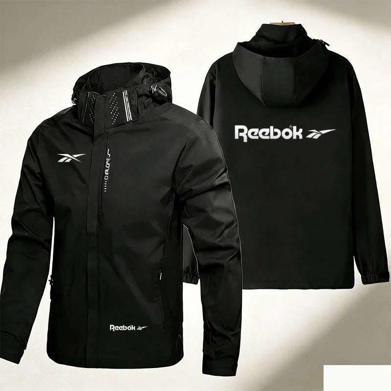 Reebok Logo Men's Waterproof and Windproof Jacket, Lightweight and Minimalist Outerwear, Hooded Outdoor Raincoat, Hiking and Mou