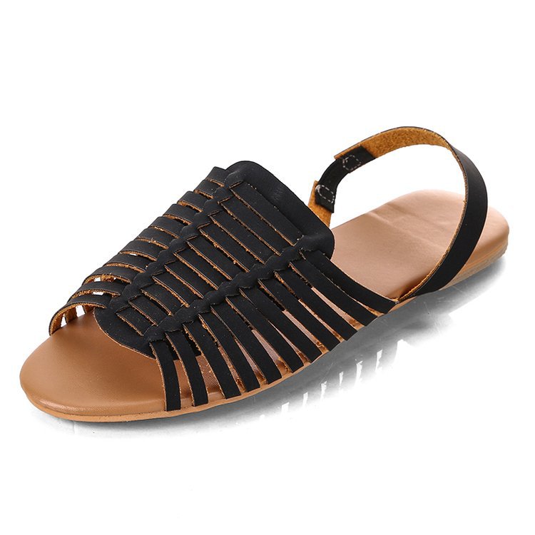 Sandalias planas caladas de espiga