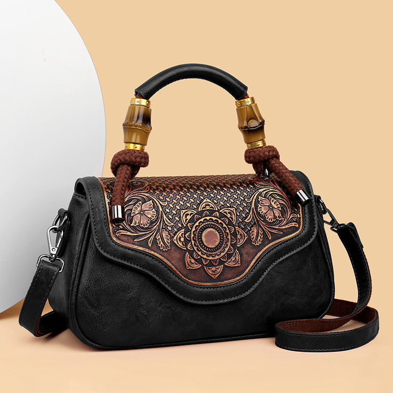 Bolso bandolera retro de cuero repujado artesanal
